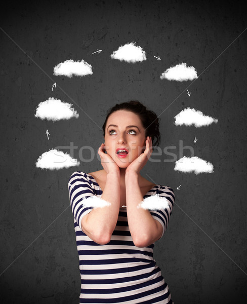 Young woman thinking with cloud circulation around her head Stock photo © ra2studio