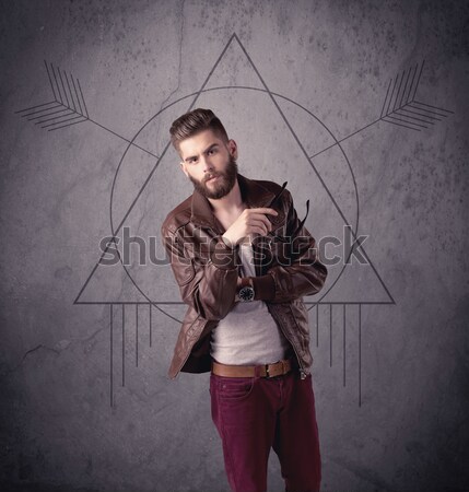 Casual funny male using mobile phone Stock photo © ra2studio