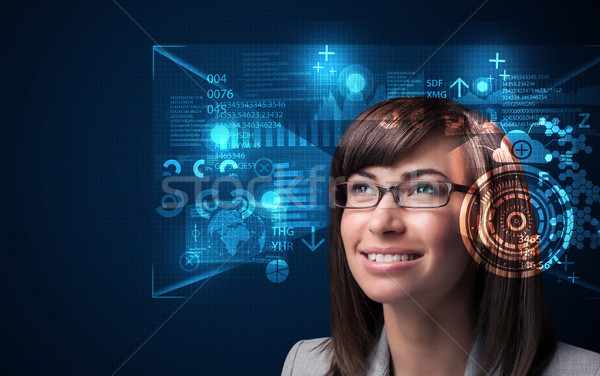 Young woman looking with futuristic smart high tech glasses  Stock photo © ra2studio