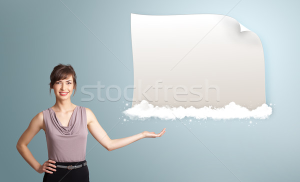 pretty woman presenting modern copy space on clouds Stock photo © ra2studio