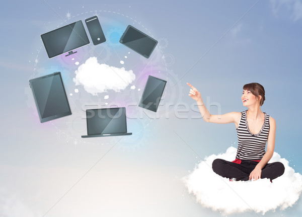 Genç kız oturma bulut bulut ağ hizmet Stok fotoğraf © ra2studio