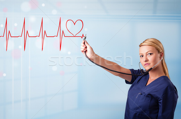 Zdjęcia stock: Młodych · pielęgniarki · słuchania · streszczenie · puls · czerwony