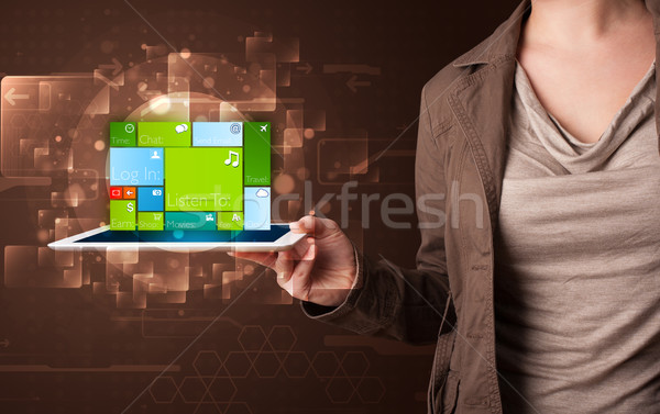Lady holding tablet with modern software operational system Stock photo © ra2studio