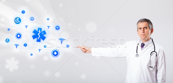 Médecin bleu médicaux icônes âge moyen homme [[stock_photo]] © ra2studio