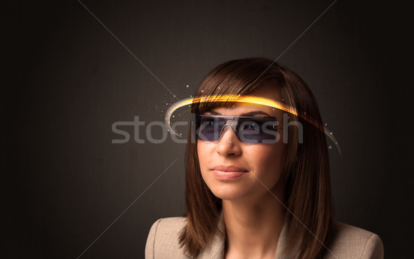 красивая женщина глядя футуристический высокий Tech очки Сток-фото © ra2studio