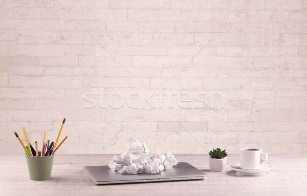 Office Desk Closeup With White Brick Wall Stock Photo C Rancz