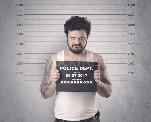 Caught offender in jail Stock photo © ra2studio