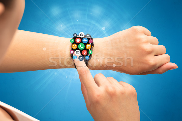 Smartwatch with application icons. Stock photo © ra2studio