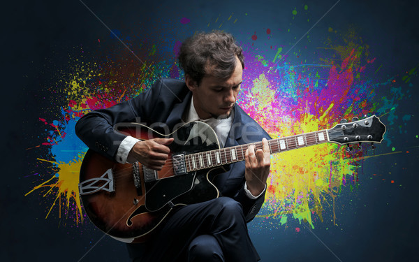 Composer with splotch and his guitar Stock photo © ra2studio