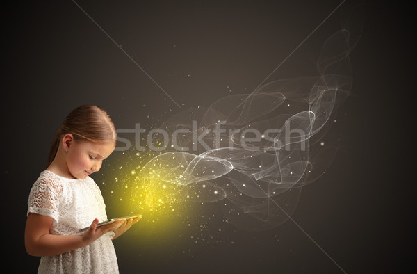 Piccolo kid giocare frizzante tablet cute Foto d'archivio © ra2studio