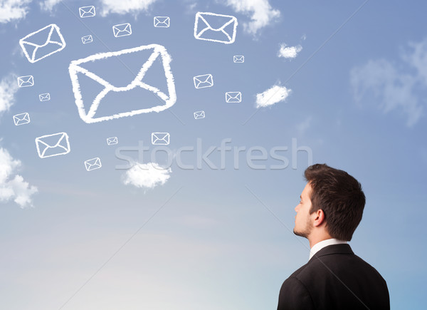 Foto stock: Empresário · olhando · e-mail · símbolo · nuvens · blue · sky