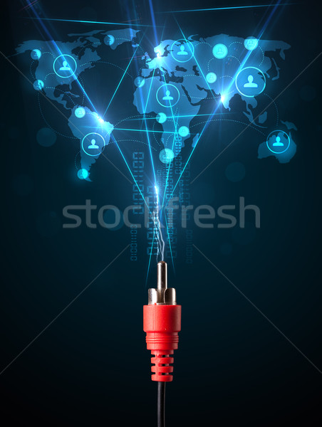 Social network icons coming out of electric cable Stock photo © ra2studio