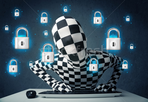 Hacker in disguise with virtual lock symbols and icons Stock photo © ra2studio