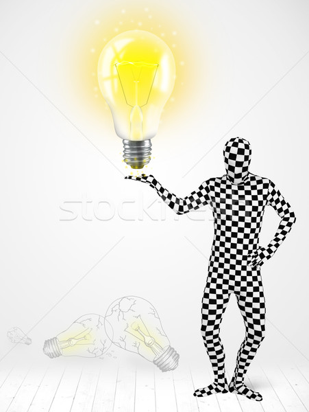 Férfi egészalakos izzó villanykörte vicces öltöny Stock fotó © ra2studio