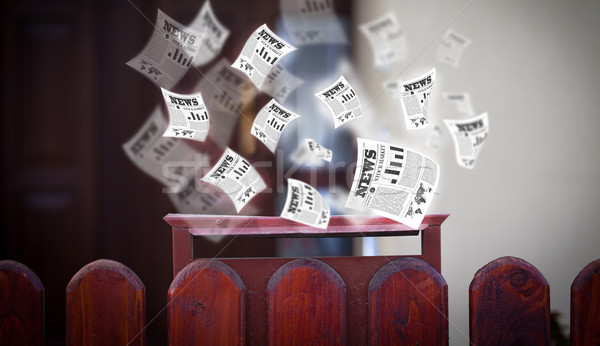 Post box with daily newspapers flying Stock photo © ra2studio