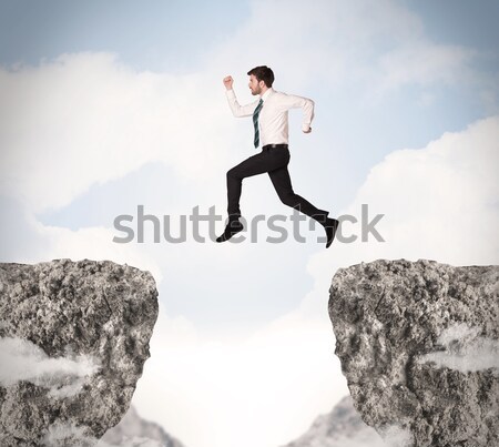 Zakenvrouw rock berg jonge permanente rand Stockfoto © ra2studio