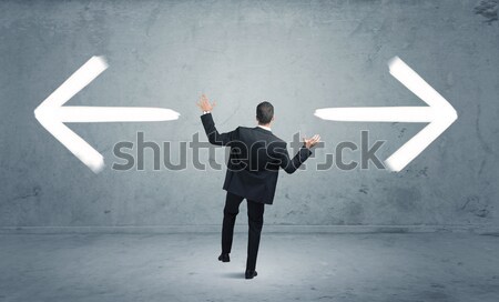 Businessman on rock mountain with a question mark Stock photo © ra2studio