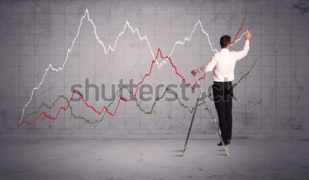 male on ladder drawing chart lines Stock photo © ra2studio