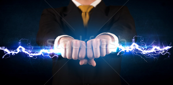 Foto stock: Homem · de · negócios · eletricidade · luz · parafuso · mãos