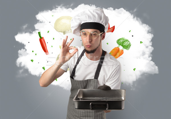 Vegetables on cloud with male cook Stock photo © ra2studio
