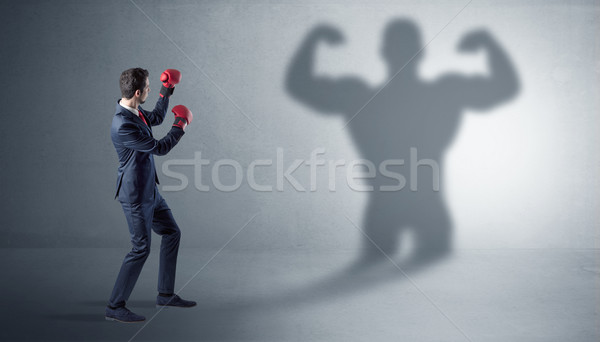 üzletember harcol árnyék kiabál test háttér Stock fotó © ra2studio