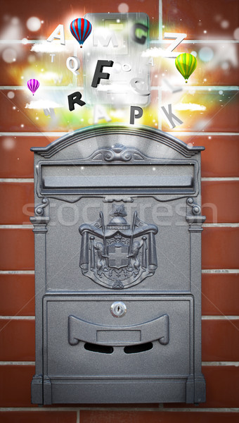 Post box with colorful letters Stock photo © ra2studio