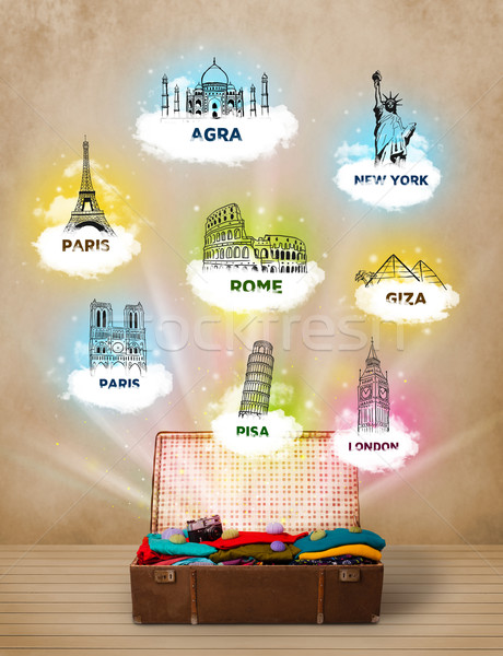 Stock photo: Tourist suitcase with famous landmarks around the world