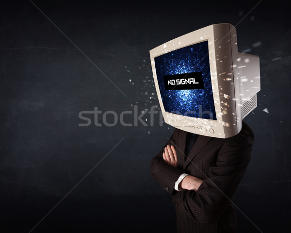 Man with a monitor head, no signal sign on the display Stock photo © ra2studio