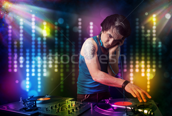 Jouer disco lumière montrent jeunes fête [[stock_photo]] © ra2studio