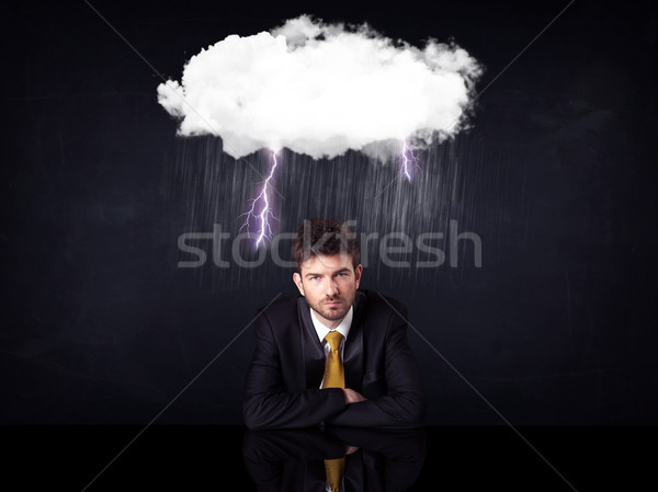 Lehangolt üzletember ül felhő villám esős Stock fotó © ra2studio