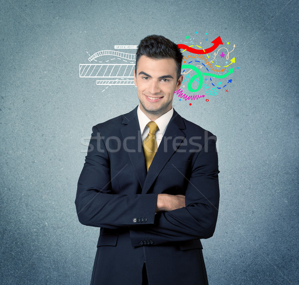 Happy creative business guy with illustration Stock photo © ra2studio