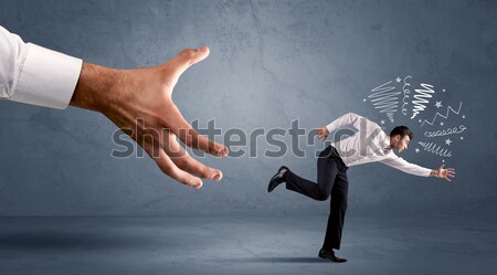 Stresszes üzletember fut nagy kéz iroda Stock fotó © ra2studio