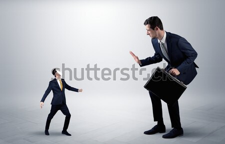 Stockfoto: Business · zakenman · handdruk · verbergen · wapen · symbolen