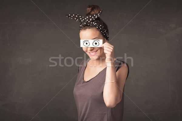 Funny woman looking with hand drawn paper eyes Stock photo © ra2studio