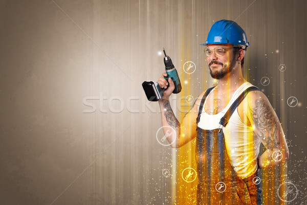 Stock photo: Manual worker with wrench symbol.