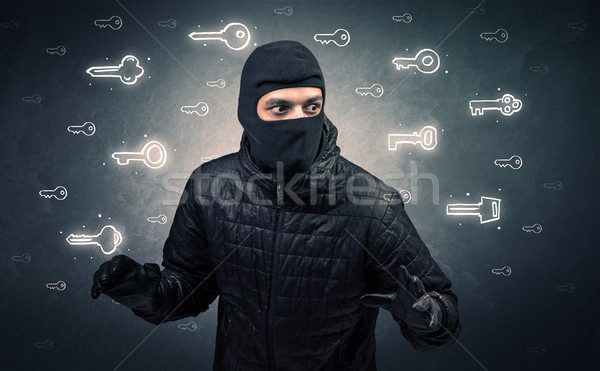 Burglar holding tool. Stock photo © ra2studio