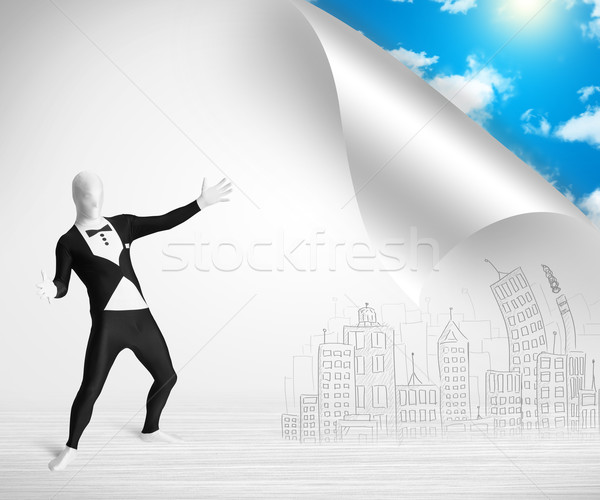 Man in body suit escaping from city to nature concept Stock photo © ra2studio