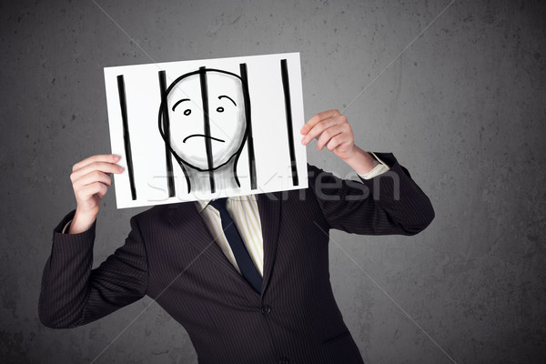 Om de afaceri hârtie prizonier in spatele bare Imagine de stoc © ra2studio
