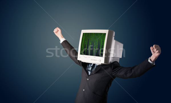Stock photo: Cyber human with a monitor screen and computer code on the displ