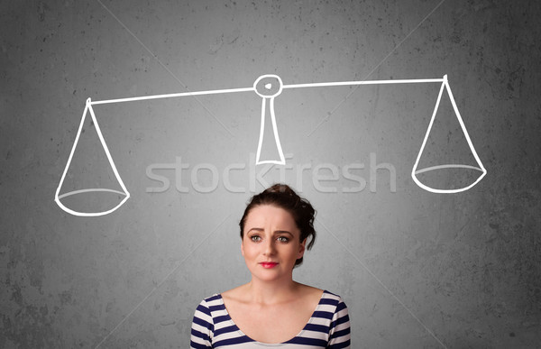 Young woman taking a decision Stock photo © ra2studio