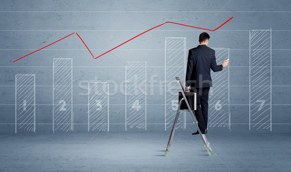 Man drawing chart from ladder Stock photo © ra2studio
