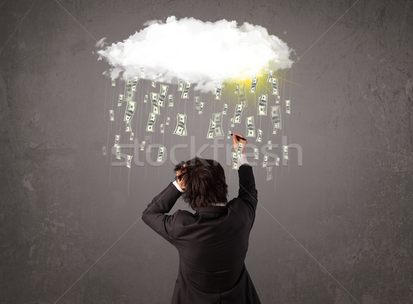 Stock photo: Business man in suit looking at cloud with falling money