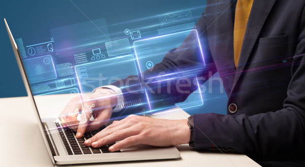 Hand typing on laptop with online finance management concept Stock photo © ra2studio