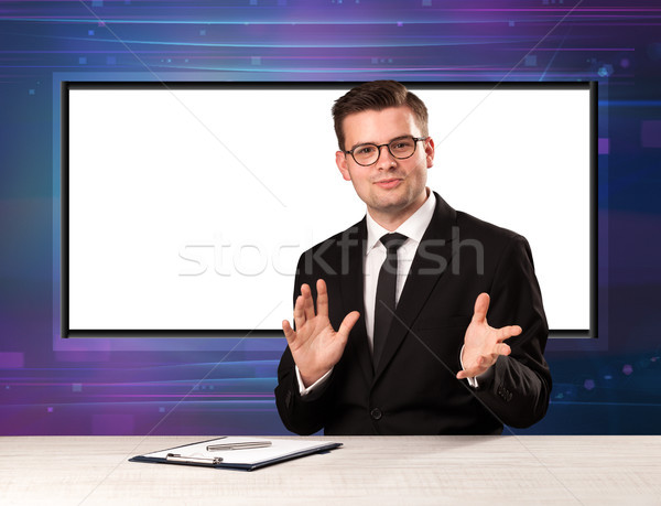 Television program host with big copy screen in his back Stock photo © ra2studio