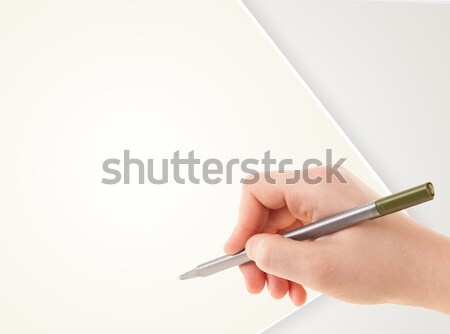 Hand writing on plain empty white paper copy space Stock photo © ra2studio