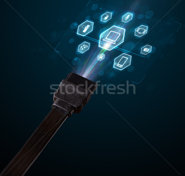 Electric cable with multimedia icons Stock photo © ra2studio