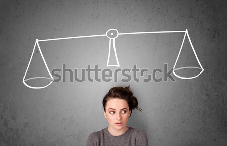 Young woman taking a decision Stock photo © ra2studio