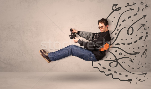 Funny man driving a flying vehicle with hand drawn lines after h Stock photo © ra2studio