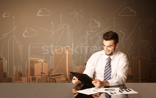 бизнесмен зданий сидят черный таблице бумаги Сток-фото © ra2studio