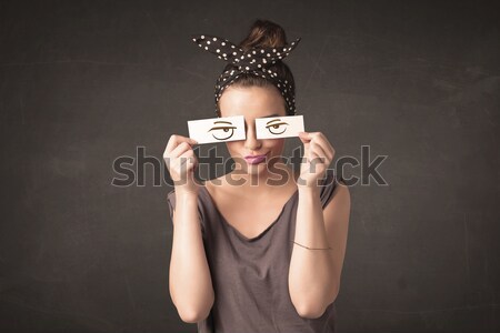 Funny woman looking with hand drawn paper eyes Stock photo © ra2studio